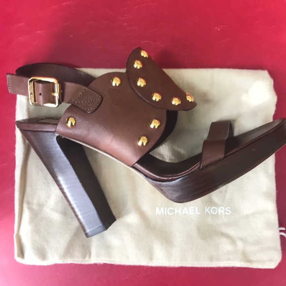 Michael Kors Shoes - Brand New Michael Kors Geneva platform sandals